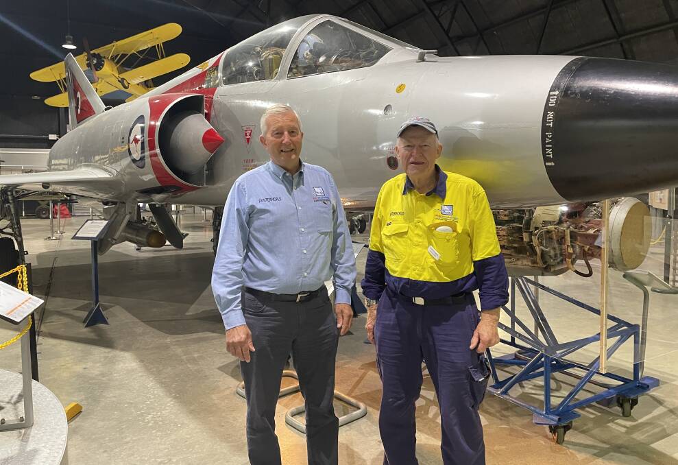 Fighter World vice president and ex-pilot Dick Coleman with a volunteer who is vital to the museum's operation. 
