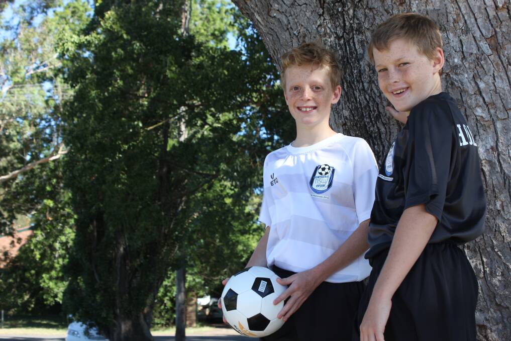 NATIONAL HONOURS: Aled Siever, 11, and Corey Holloway, 12, will represent Australia in futsal.