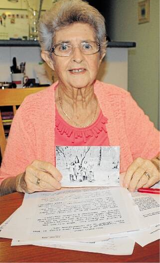 RESEARCHER: Port Stephens Family Historical Society member Lorraine Cottam with material for a book the group is releasing. Picture: Ellie-Marie Watts