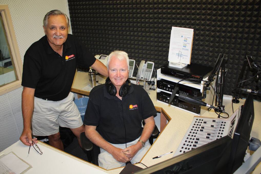 ALL CHANGE: Port Stephens FM community radio station president George Anderson with outgoing president Bob McKay.