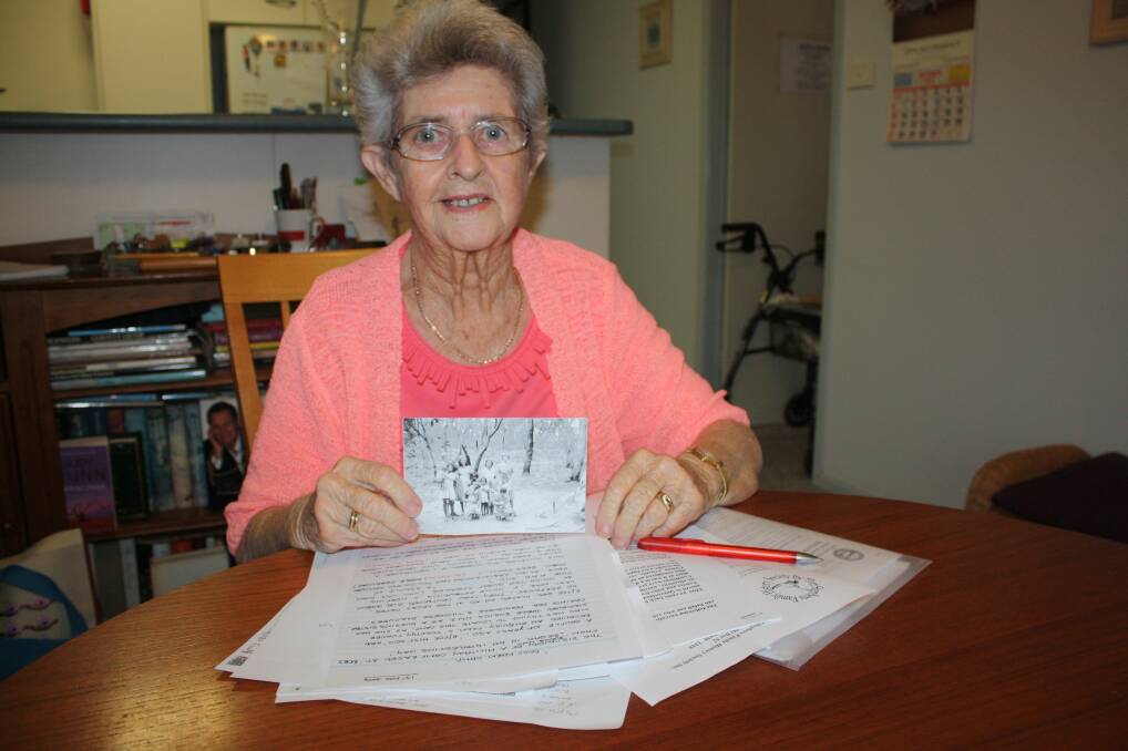 RESEARCHER: Port Stephens Family Historical Society member Lorraine Cottam with material for a book the group is releasing. Picture: Ellie-Marie Watts
